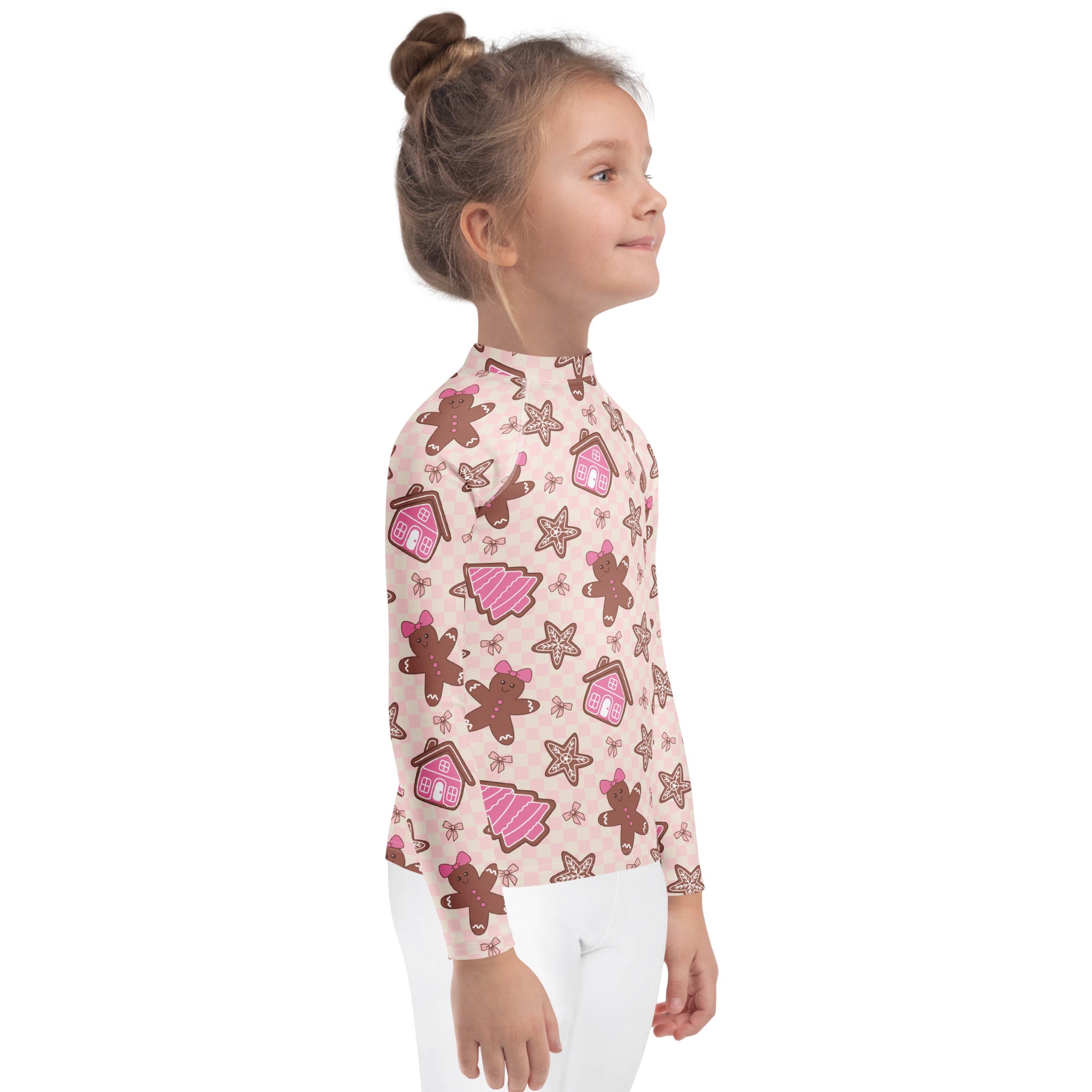 Kids pink long sleeve rash guard swim shirt with playful gingerbread men pattern and upf 50 plus sun protection