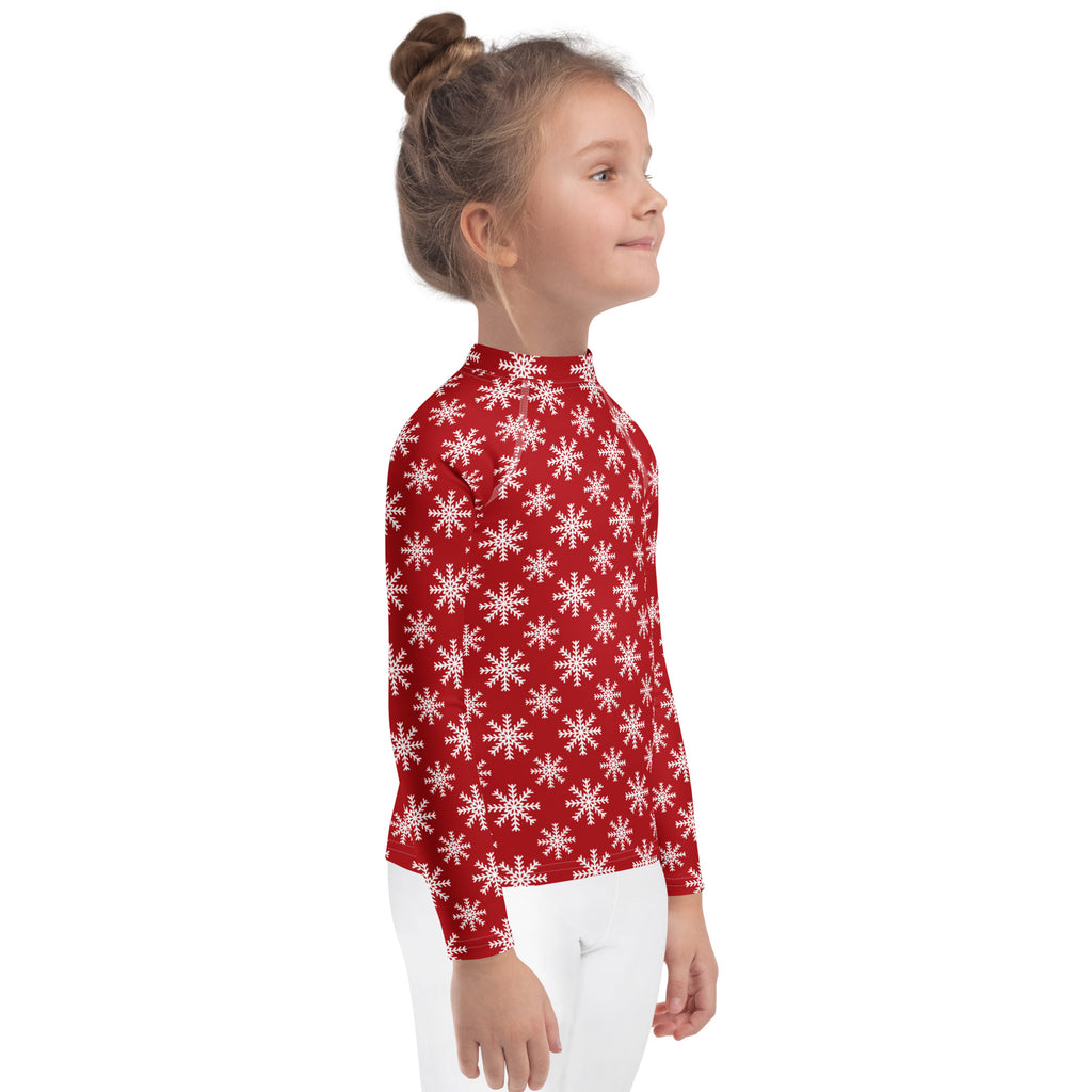 Kids red long sleeve rash guard swim shirt with white snowflake pattern and upf 50 plus for sun protection