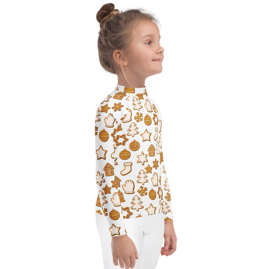 White kids christmas gingerbread cookie long sleeve rash guard swim shirt with festive gold pattern and upf 50+ protection