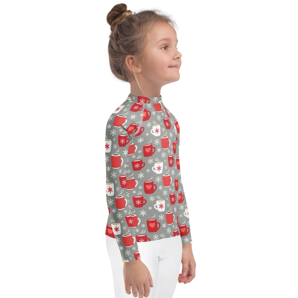 A kids gray long sleeve rash guard swim shirt with red and white mug festive pattern and upf 50 plus protection