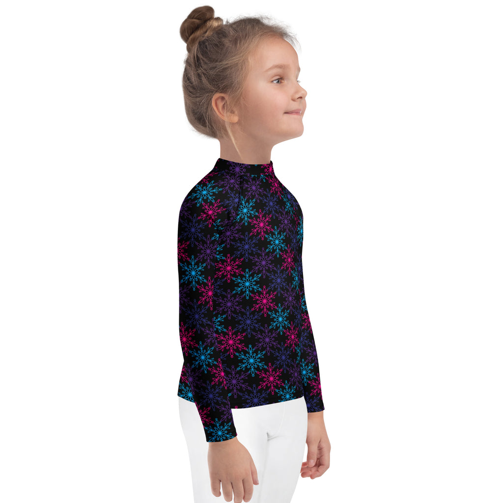 Kids neon snowflakes christmas long sleeve rash guard swim shirt with uv protection featuring blue and pink snowflakes on black