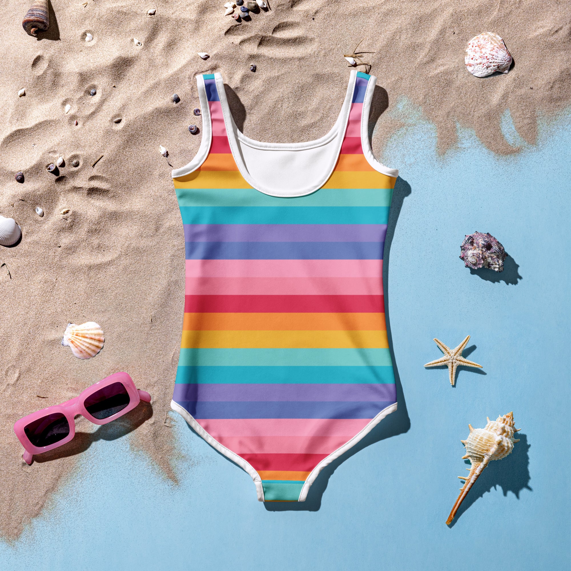 Girls bright rainbow striped buttery soft one-piece swimsuit with white trim and UPF 50 plus sun protection