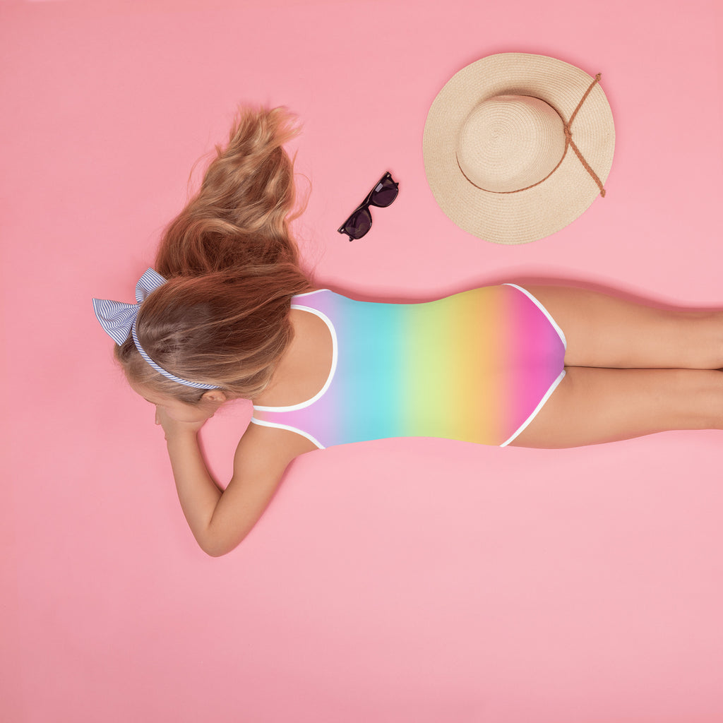 Girls bright rainbow one-piece swimsuit with white trim buttery soft fabric and upf 50 plus sun protection