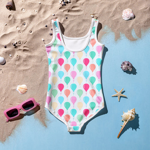White one-piece girls birthday balloons buttery soft swimsuit with pastel balloon pattern and upf 50 plus protection