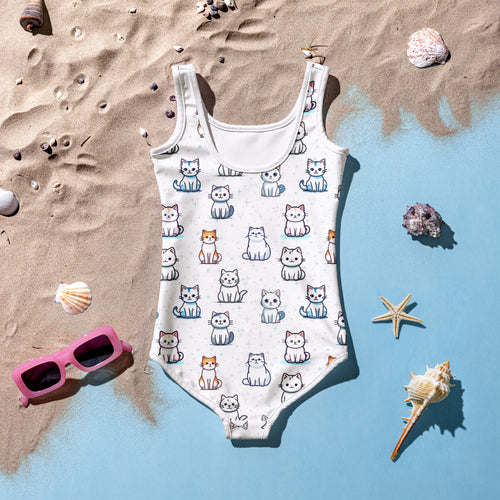 White girls cat-themed buttery soft one-piece swimsuit with colorful cartoon cats and UPF 50 plus protection