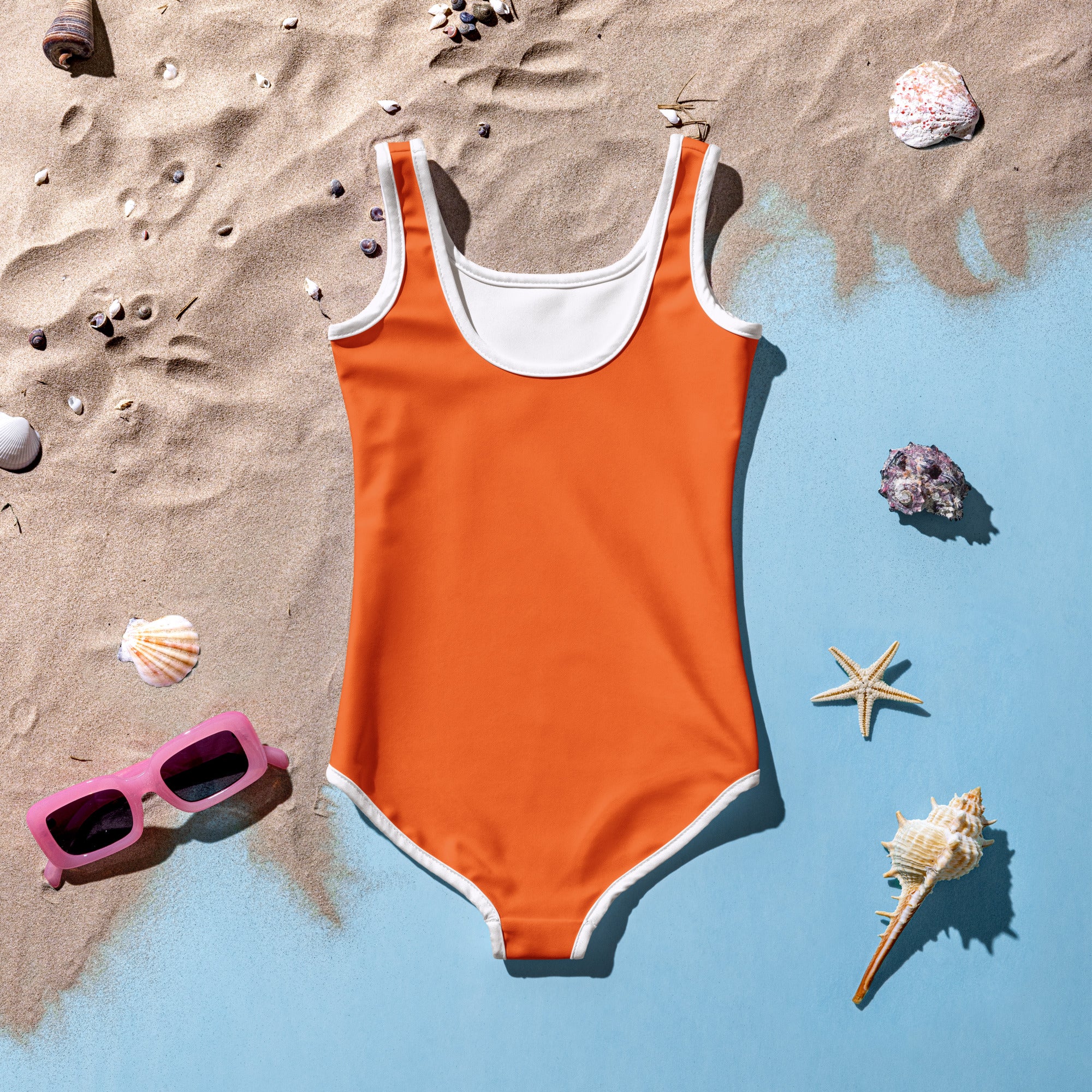 A vibrant orange girls one-piece buttery soft swimsuit with white trim and UPF 50 plus sun protection