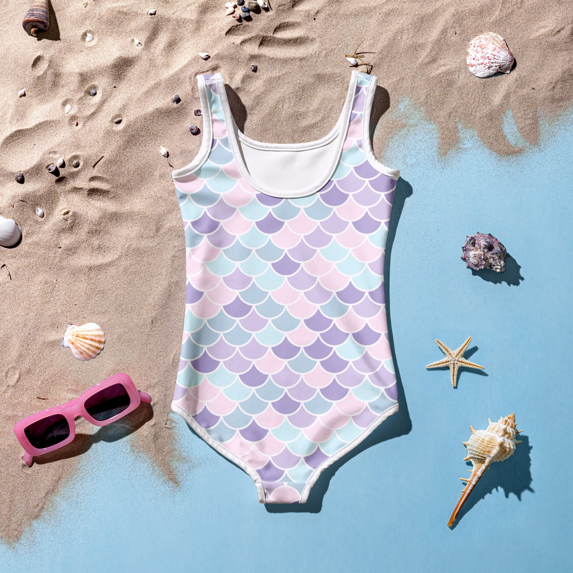 Girls purple mermaid scales buttery soft one-piece swimsuit with pastel pattern white trim and upf 50 plus protection