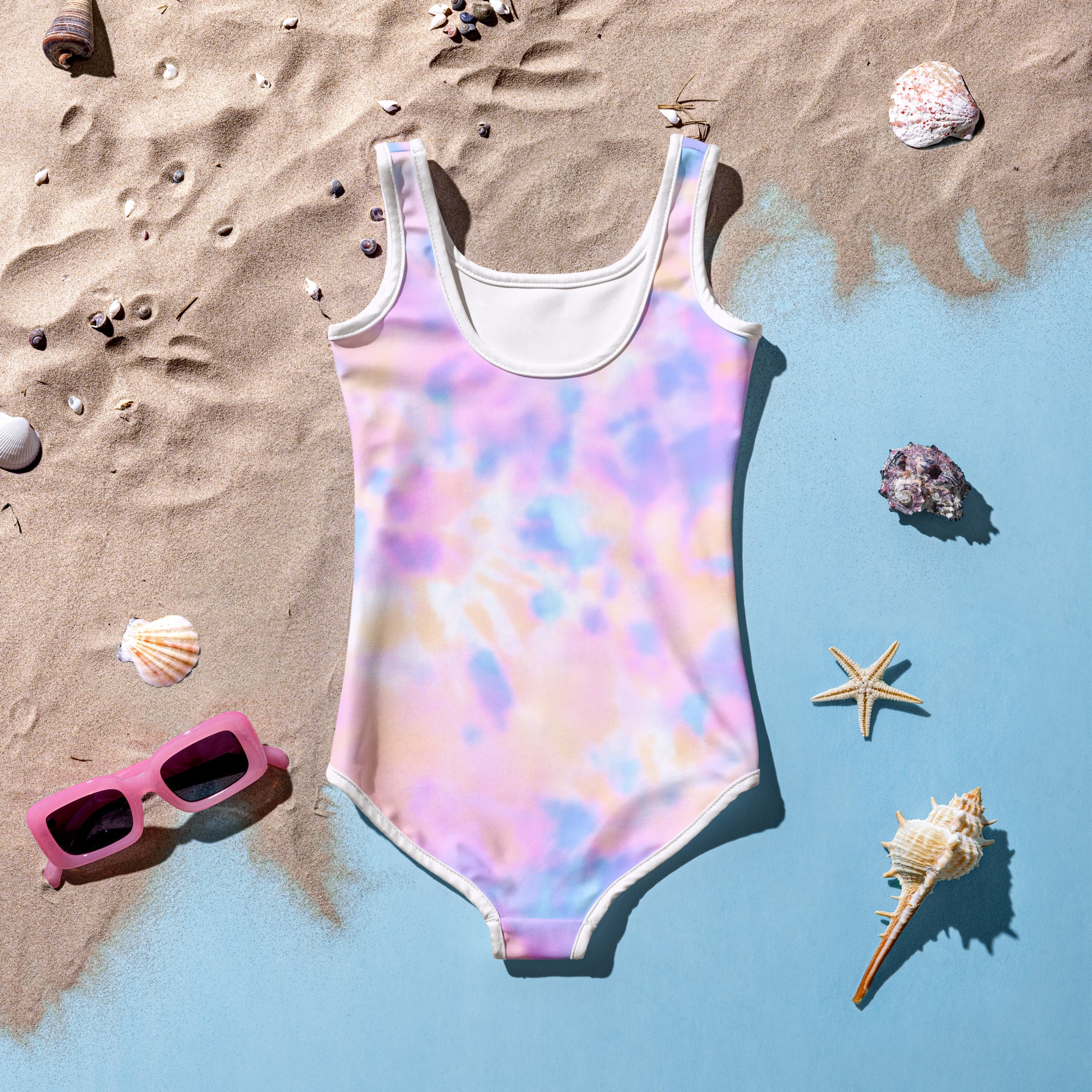 Girls pastel tie-dye one-piece swimsuit with white trim buttery soft fabric and UPF 50 plus sun protection