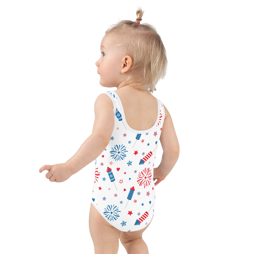 Girls fireworks and sparklers 4th of july buttery soft swimsuit in white with red blue and white fireworks and star patterns