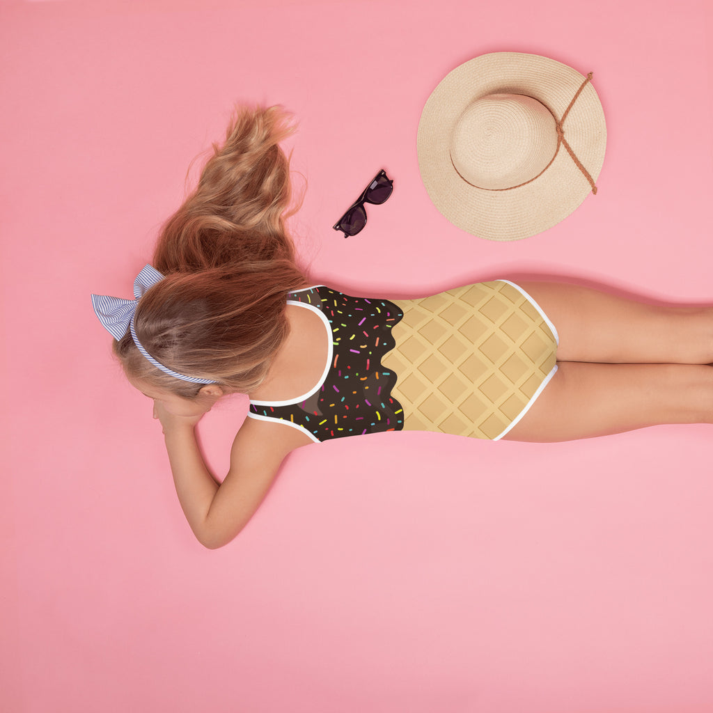 Girls ice cream cone custom age birthday swimsuit with black chocolate scoop, colorful sprinkles, and beige waffle cone