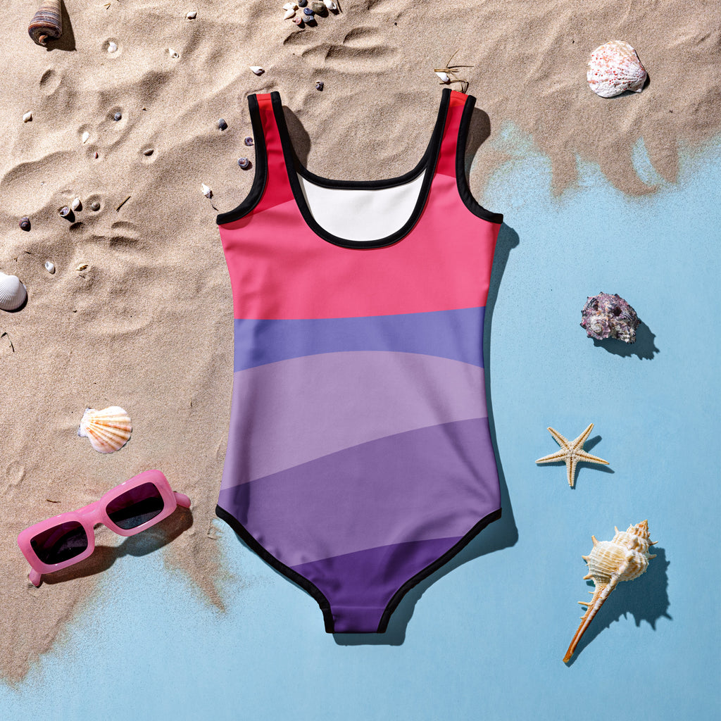 Girls abstract waves one piece swimsuit with bold pink purple lavender stripes and black trim upf 50 plus swimwear