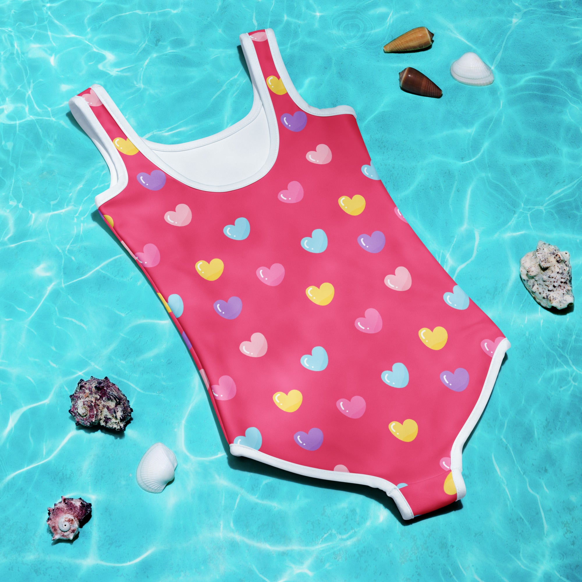 Girls colorful hearts pink buttery soft swimsuit with white trim and UPF 50 plus for sun protection and comfort