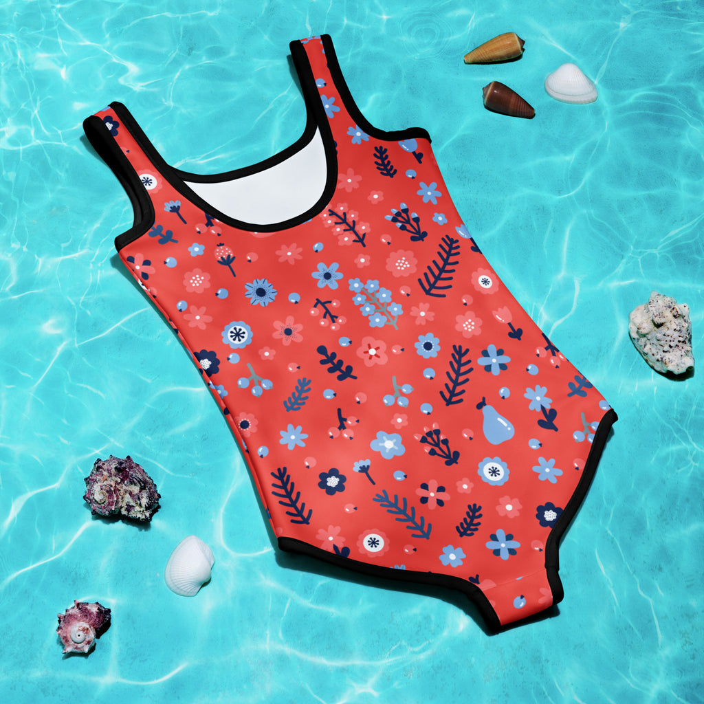 Coral-colored girls floral swimsuit with blue navy pattern black trim buttery soft fabric upf 50+ protection