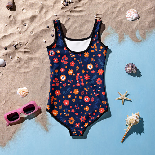 A navy blue girls one-piece swimsuit with vibrant orange red and white floral pattern and buttery soft fabric with upf 50+