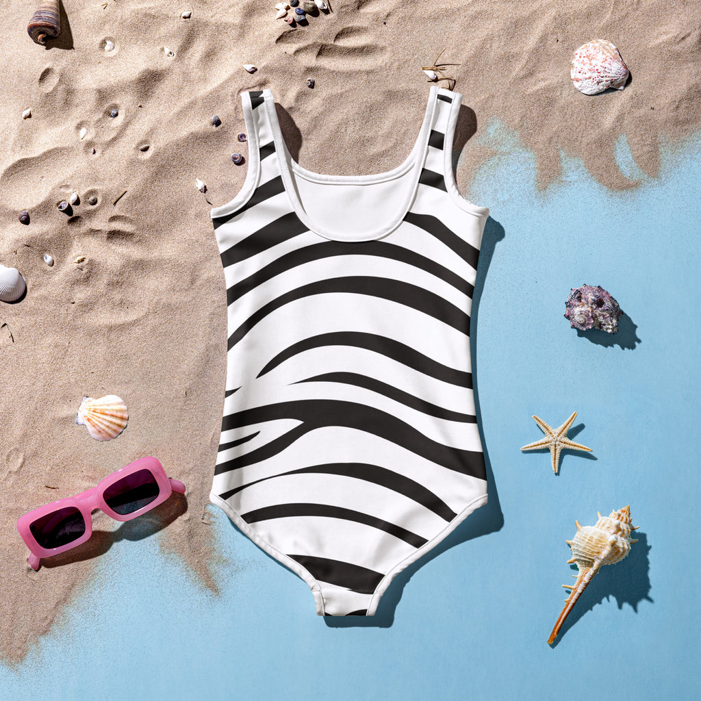 White girls one-piece swimsuit with bold black zebra stripes buttery soft fabric and upf 50 plus protection