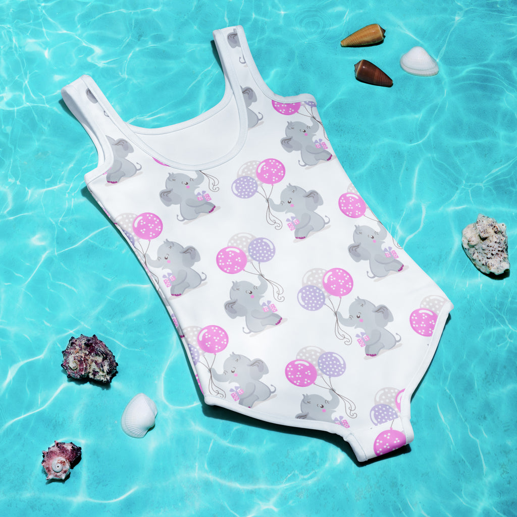 White girls one-piece swimsuit with buttery soft fabric and gray elephants holding pink and purple balloons with UPF 50+
