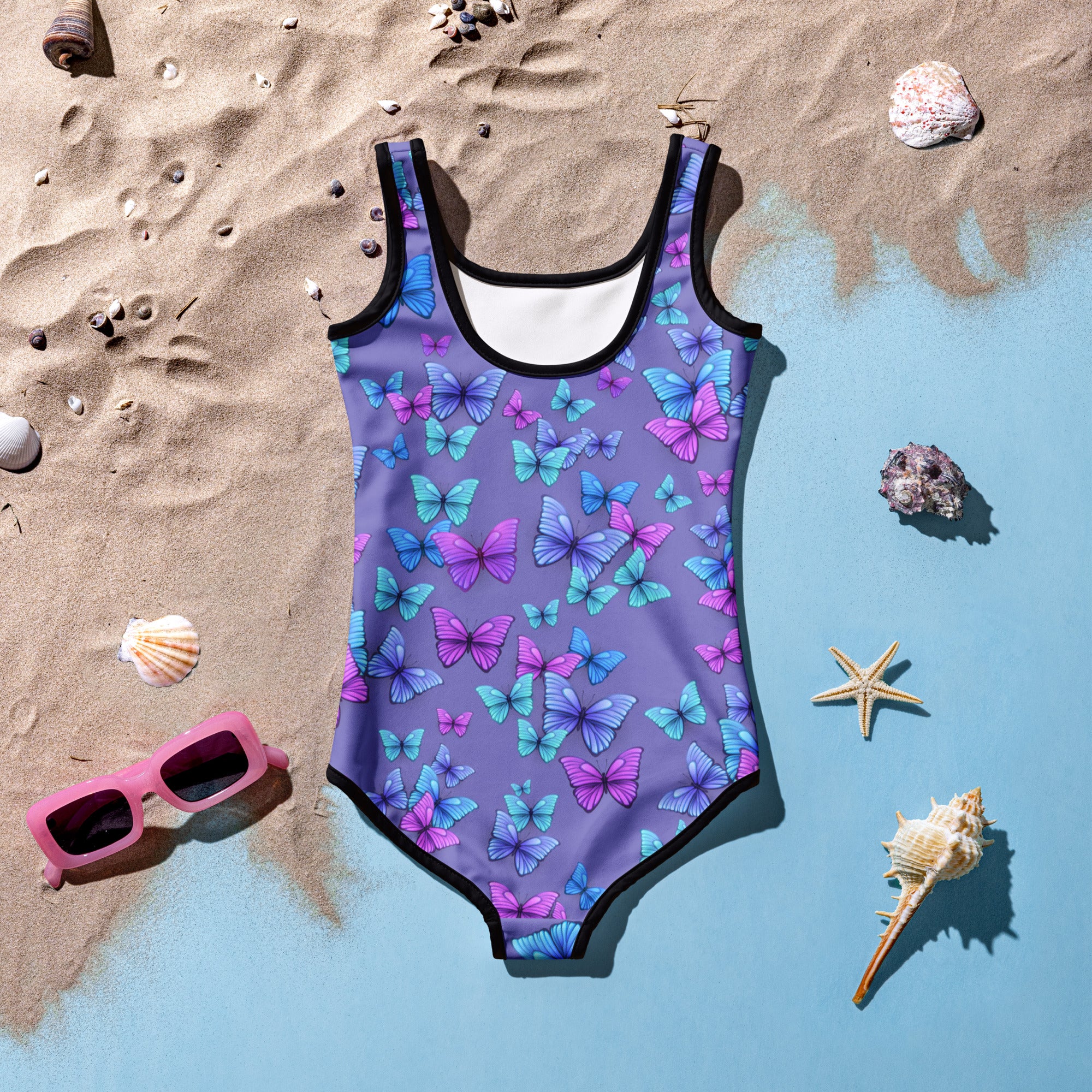 Girls purple butterflies buttery soft swimsuit with upf 50 featuring blue and pink butterfly pattern and black trim