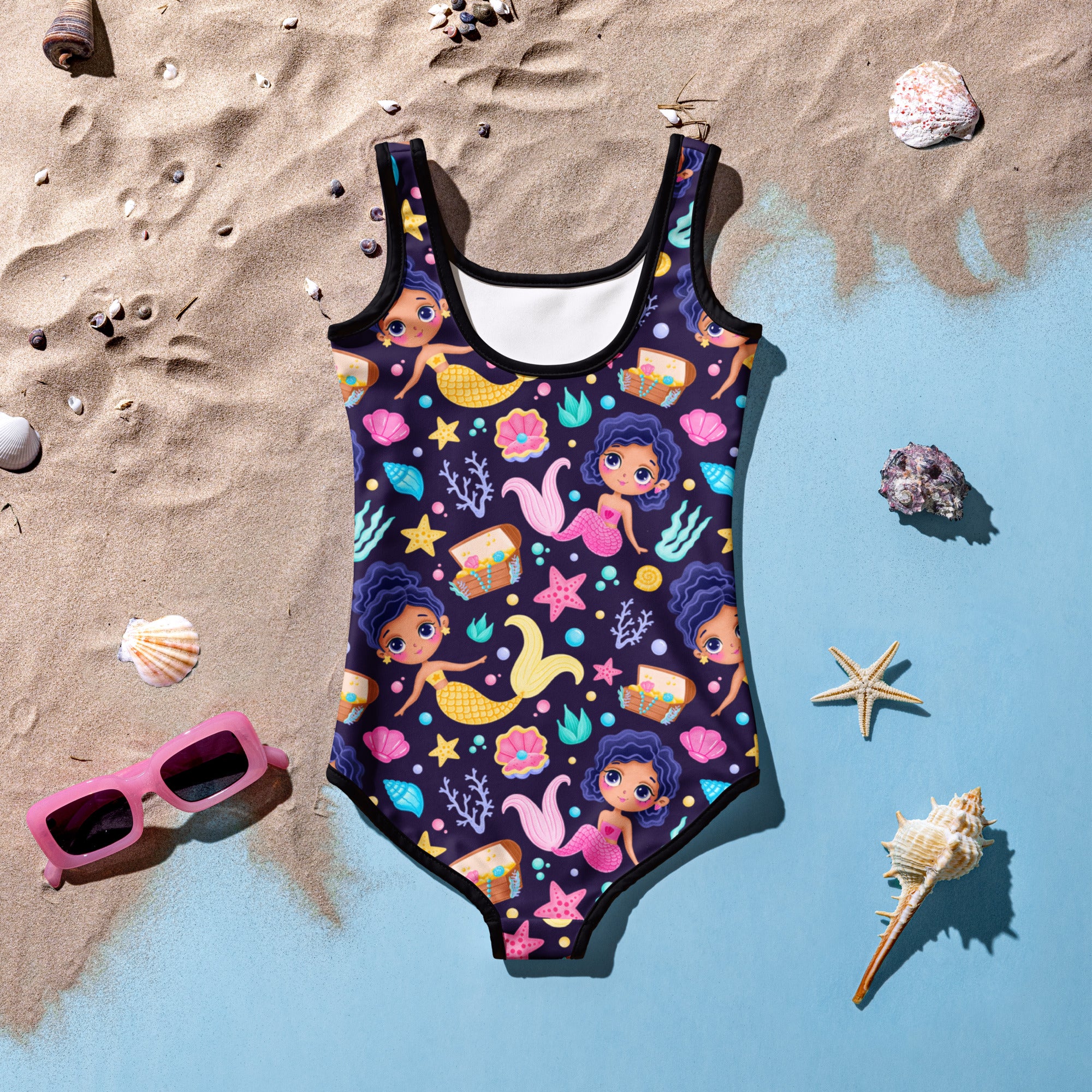 Navy blue girls one-piece swimsuit with playful mermaid and sea treasure pattern in vibrant colors and buttery soft fabric with UPF 50+