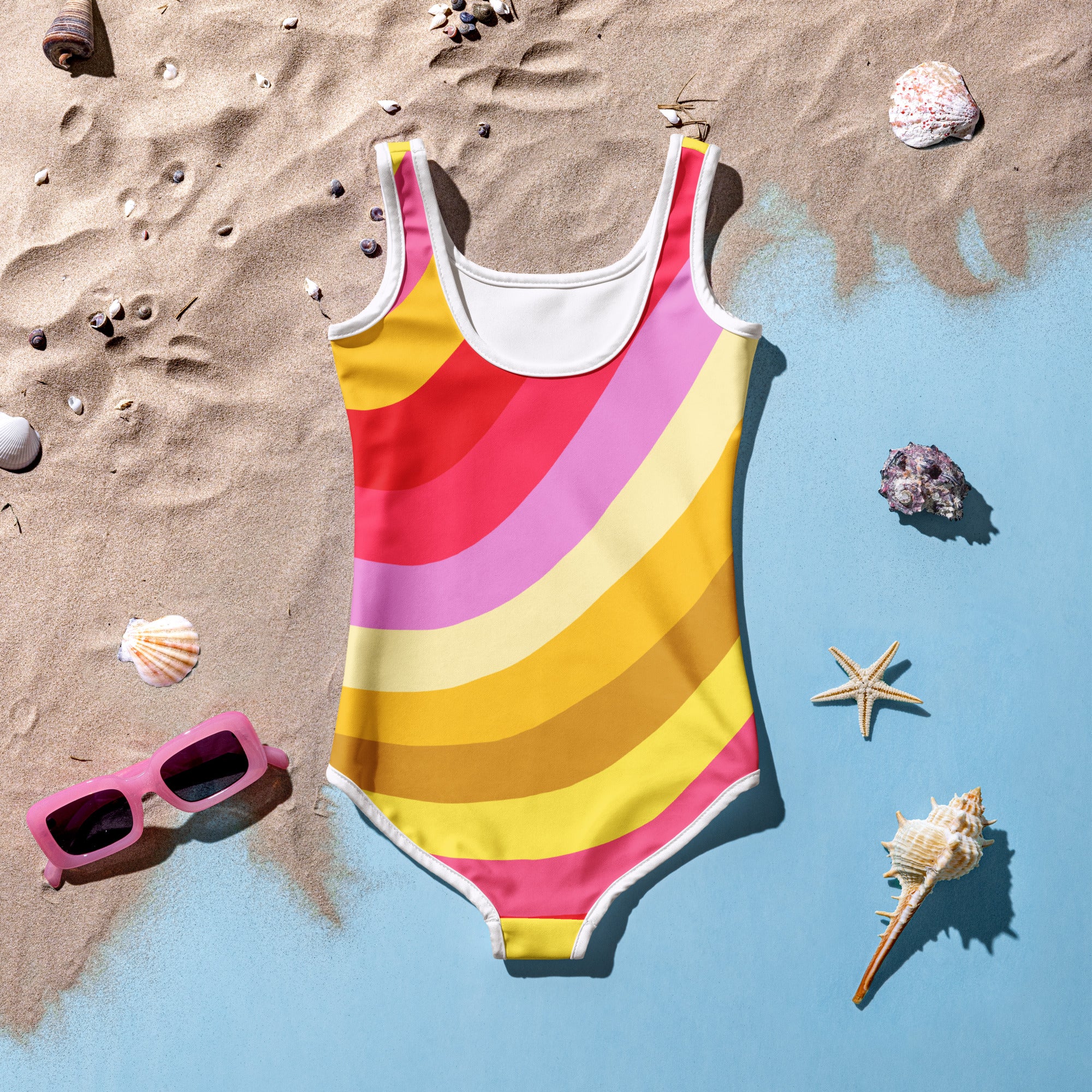 Girls sunset rainbow waves buttery soft one-piece swimsuit with diagonal pink red yellow orange stripes and white trim