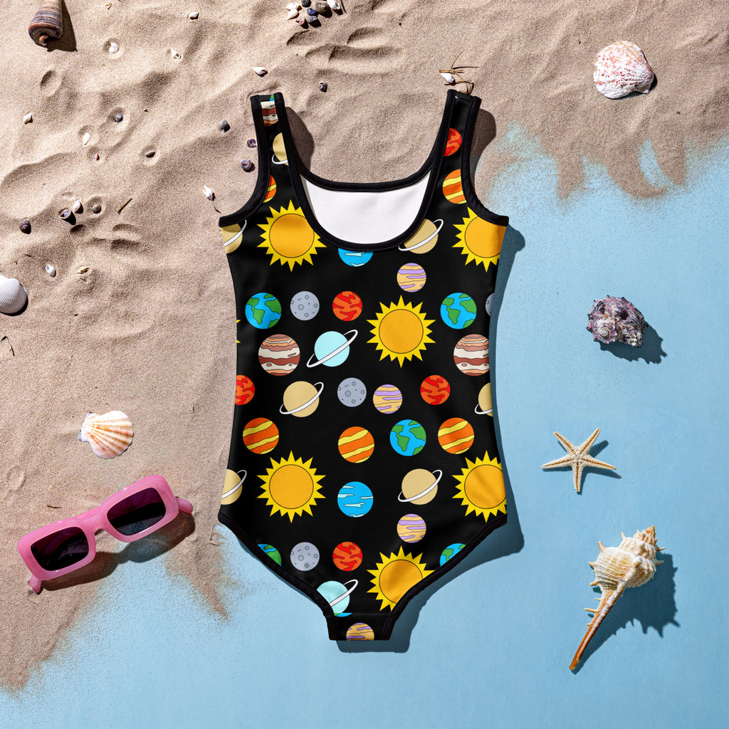Black girls solar system buttery soft swimsuit with upf 50 featuring vibrant yellow suns and colorful planets on black