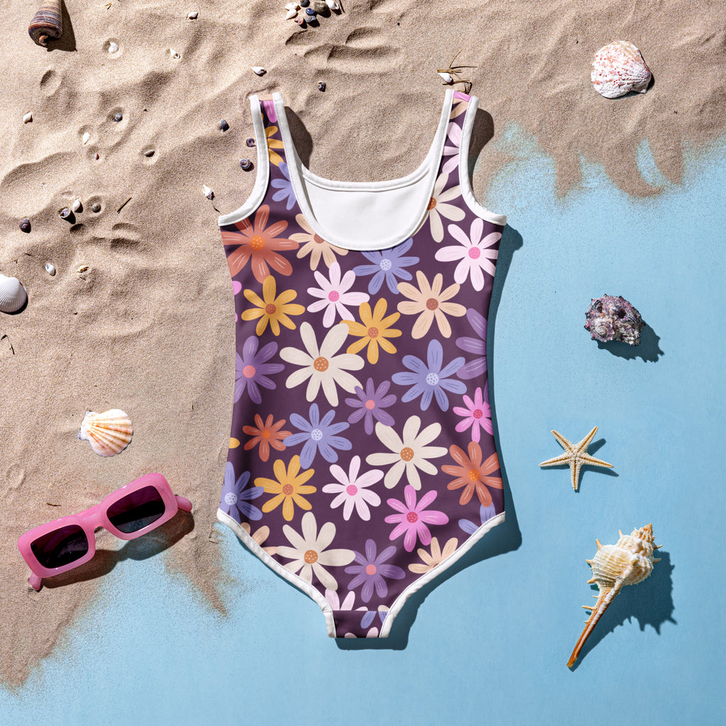 Girls retro floral buttery soft one-piece swimsuit with upf 50 plus purple base and colorful daisy patterns