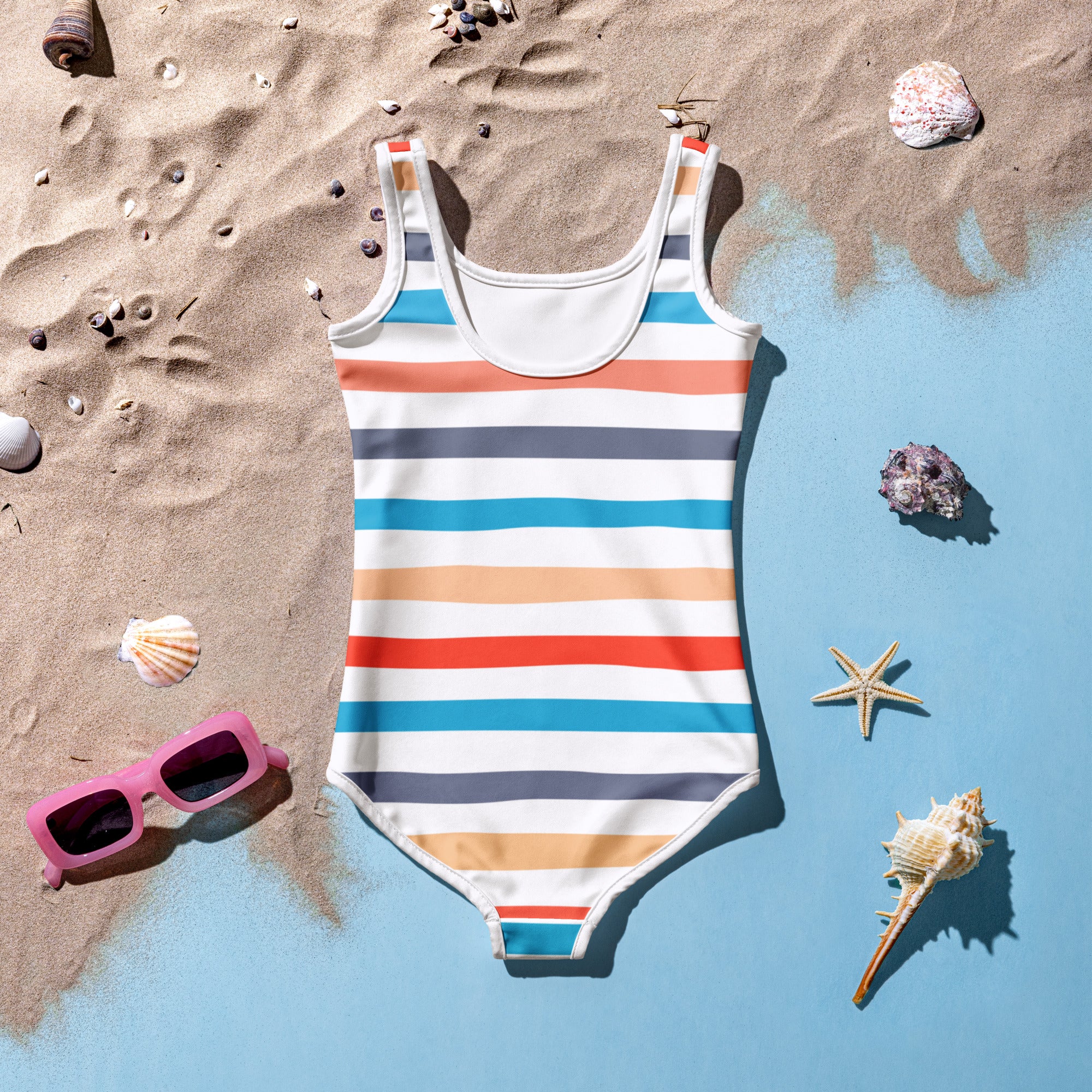 A girls coastal stripes buttery soft one-piece swimsuit with coral teal white and gray horizontal stripes and UPF 50+ protection