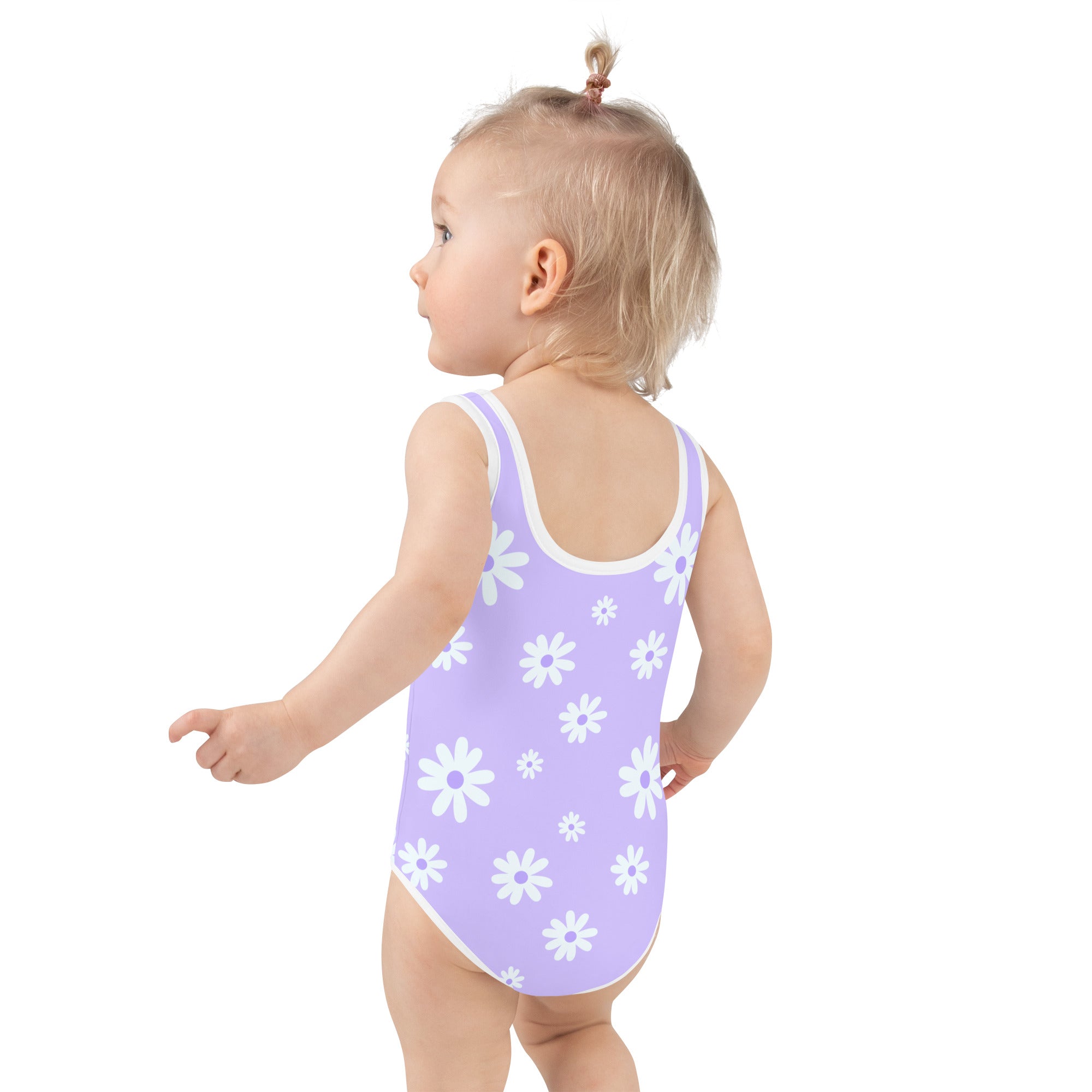 Lavender girls one-piece swimsuit with white daisy patterns and white trim made of buttery soft fabric with UPF 50+ protection