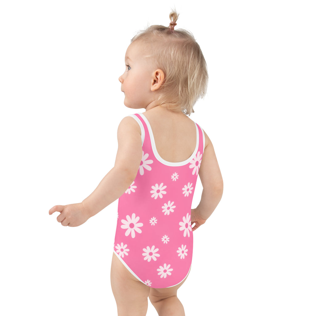 Girls pink daisy buttery soft one-piece swimsuit with white trim and UPF 50 plus sun protection