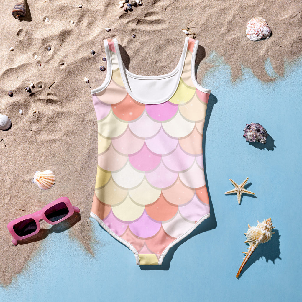 Girls pink and orange pastel mermaid-scale one-piece swimsuit with white trim and buttery soft fabric upf 50+