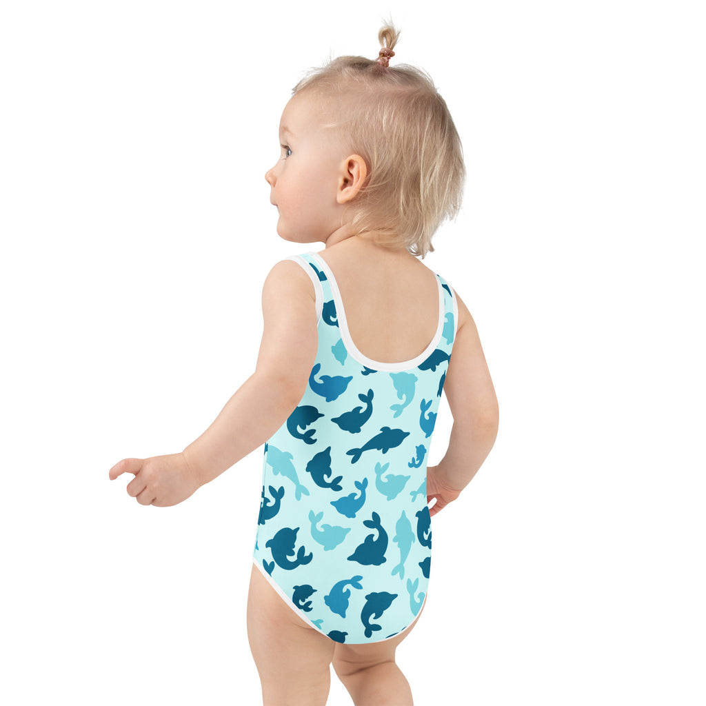 Girls blue dolphin buttery soft one-piece swimsuit with upf 50 plus featuring playful dolphin pattern and white trim