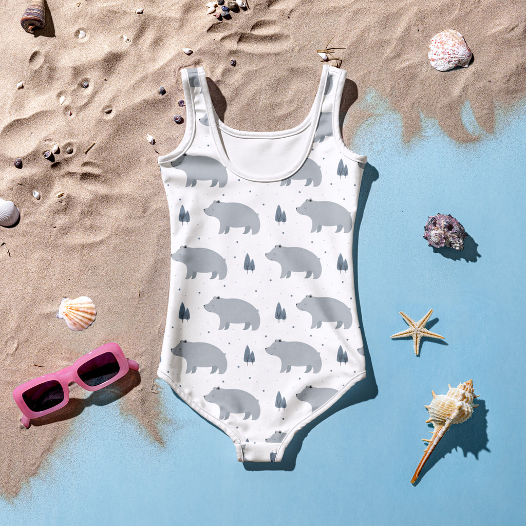 Girls buttery soft white one-piece swimsuit with gray polar bear and tree pattern and UPF 50+ sun protection