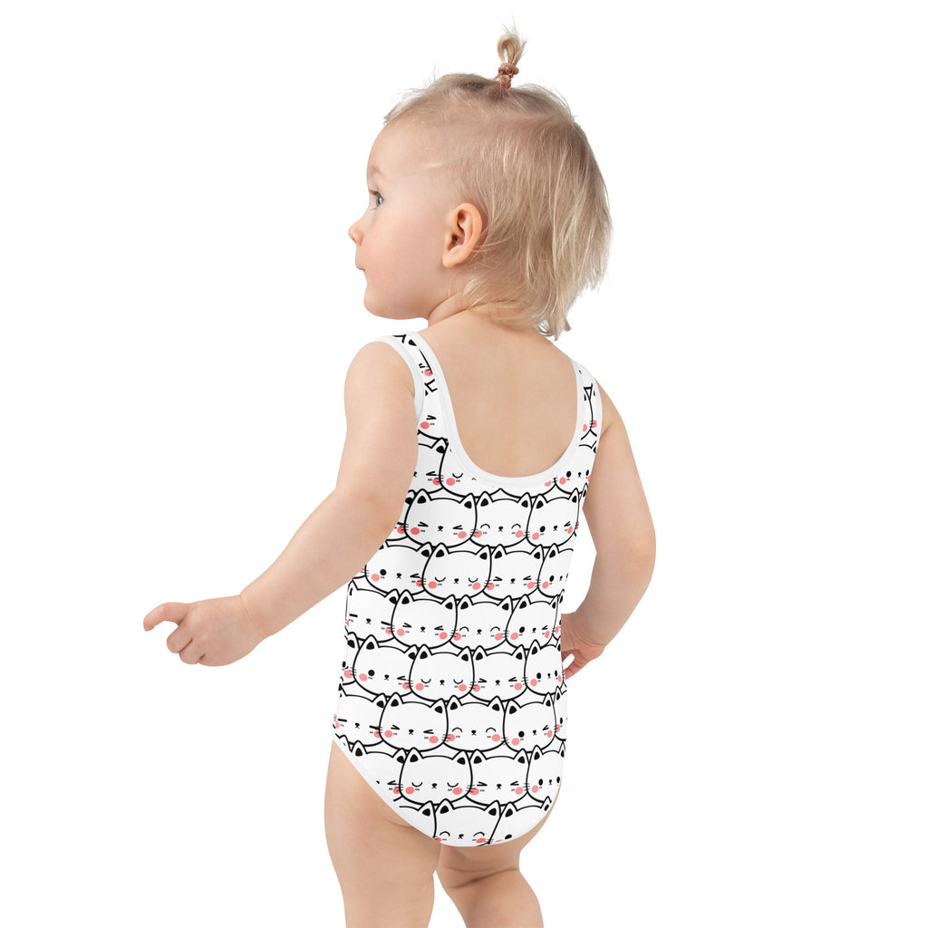 White girls one-piece swimsuit with black-outlined kawaii cat faces pink cheeks buttery soft fabric upf 50+