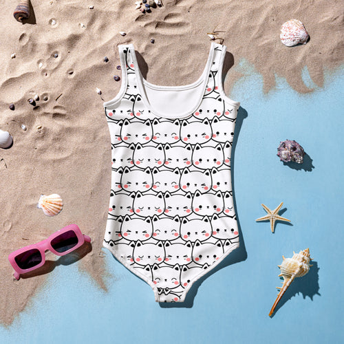 White girls one-piece swimsuit with playful black-outlined cartoon cats and pink blush cheeks butter soft with UPF 50+