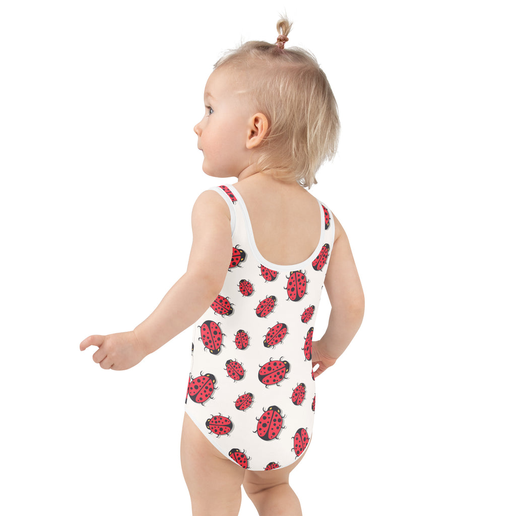 White girls one-piece swimsuit with red ladybug prints buttery soft fabric and upf 50 plus sun protection