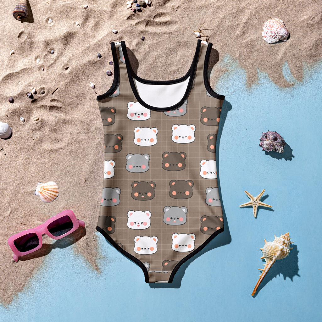A brown girls one-piece buttery soft swimsuit with a cute bear face pattern black trim and UPF 50 plus protection