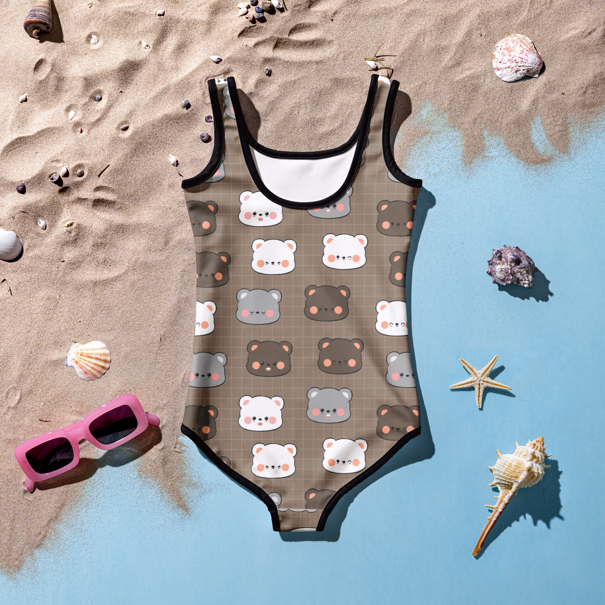 A brown girls one-piece buttery soft swimsuit with a cute bear face pattern black trim and UPF 50 plus protection