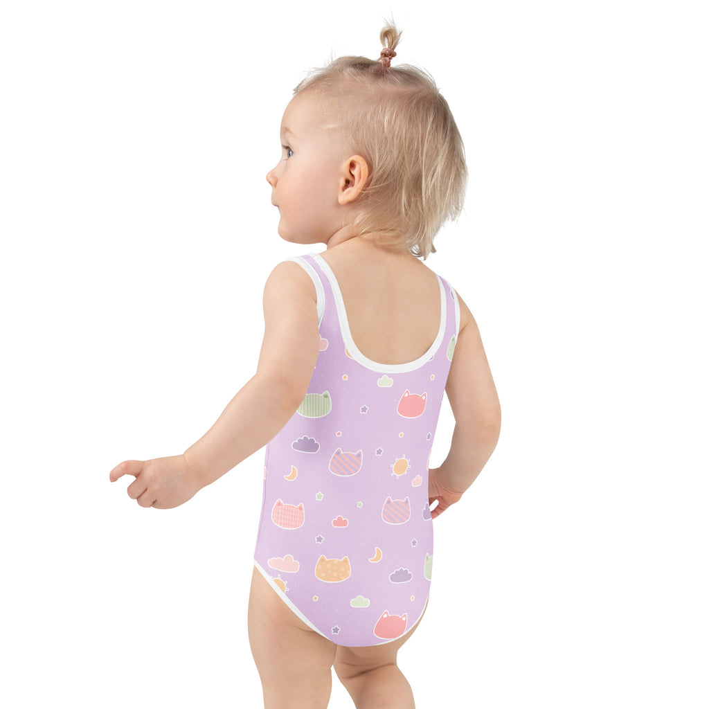 Lavender one-piece girls swimsuit with white trim pastel cats clouds moons buttery soft fabric upf 50+ protection