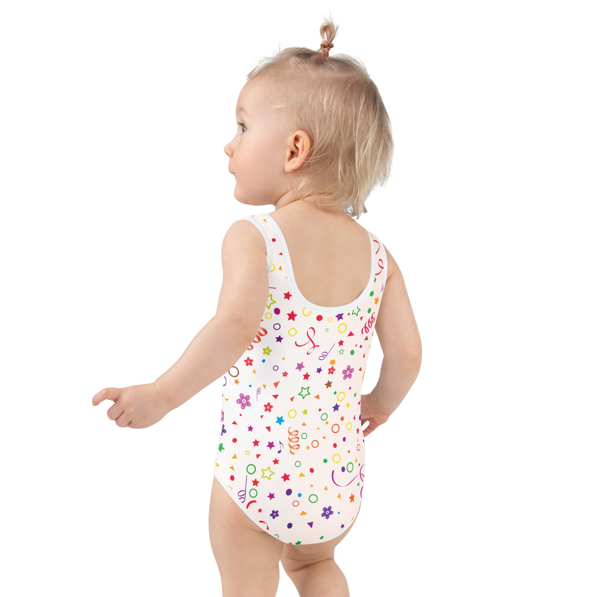 A white girls party confetti buttery soft swimsuit with colorful stars flowers confetti shapes and UPF 50 plus protection