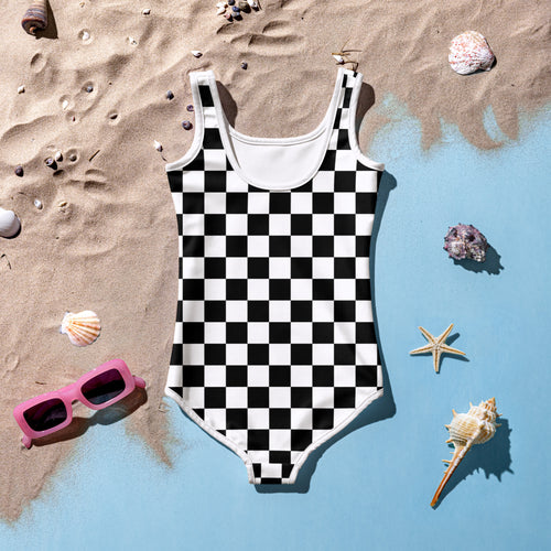 Girls black and white checkered one-piece swimsuit with white trim made of buttery soft fabric and UPF 50+ protection