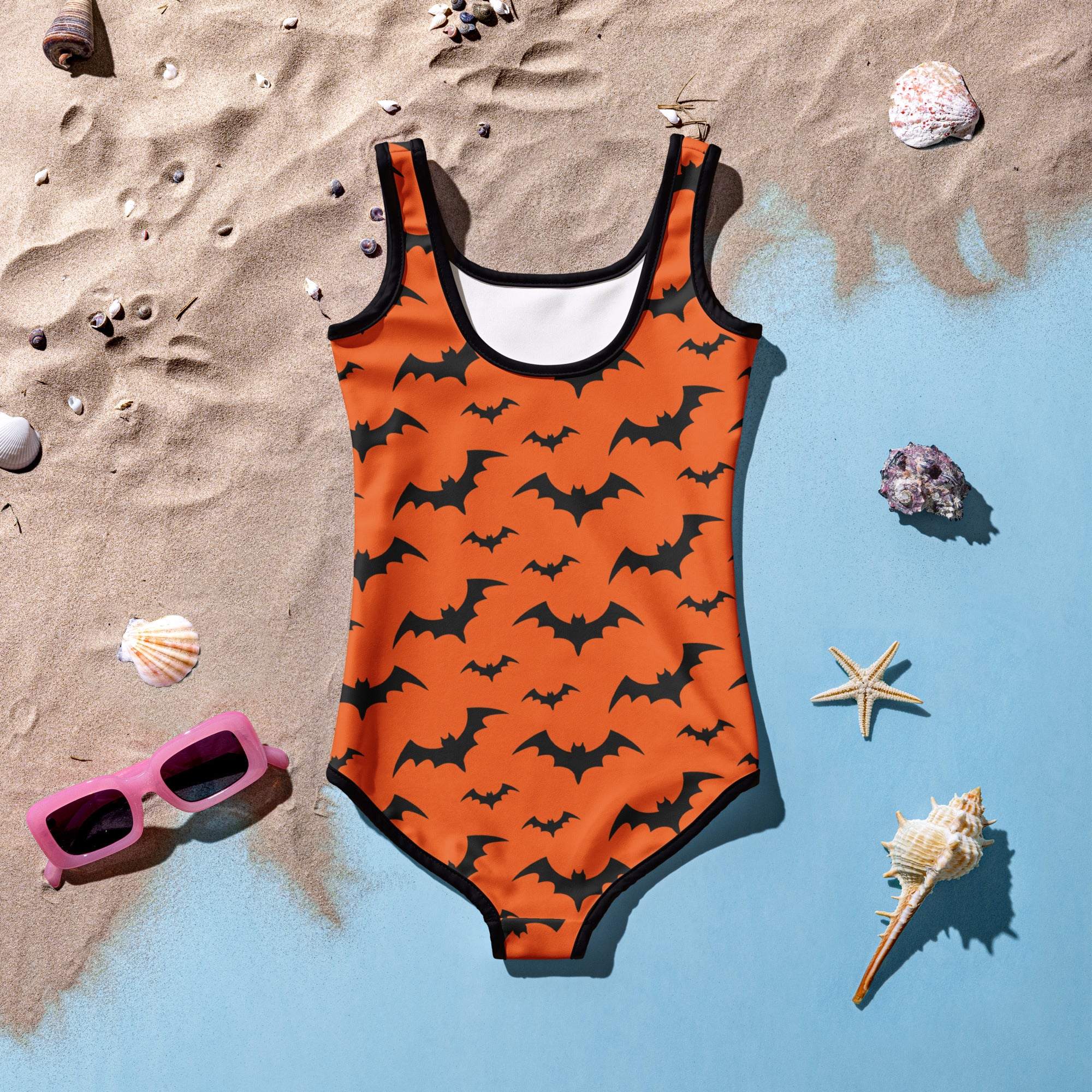 Girls orange one-piece buttery soft swimsuit with black bats pattern black trim and UPF 50 plus protection for Halloween