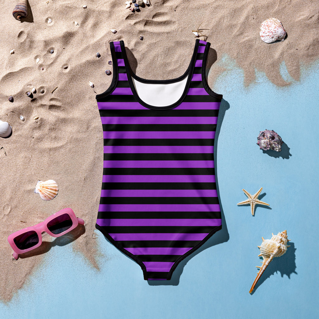 Girls purple and black striped buttery soft one-piece swimsuit with white lining and upf 50 plus protection