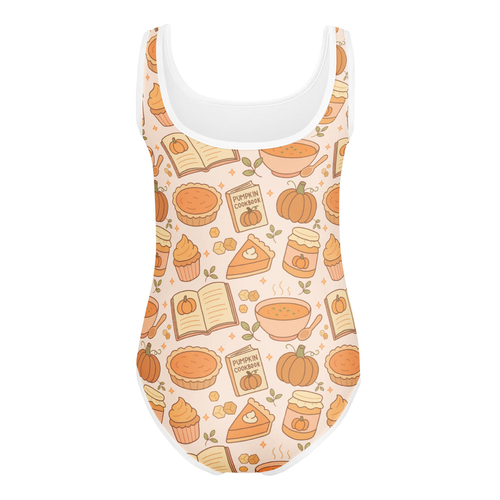 Beige girls pumpkin pie themed buttery soft leotard with white trim and autumn kitchen pattern for dance and gymnastics