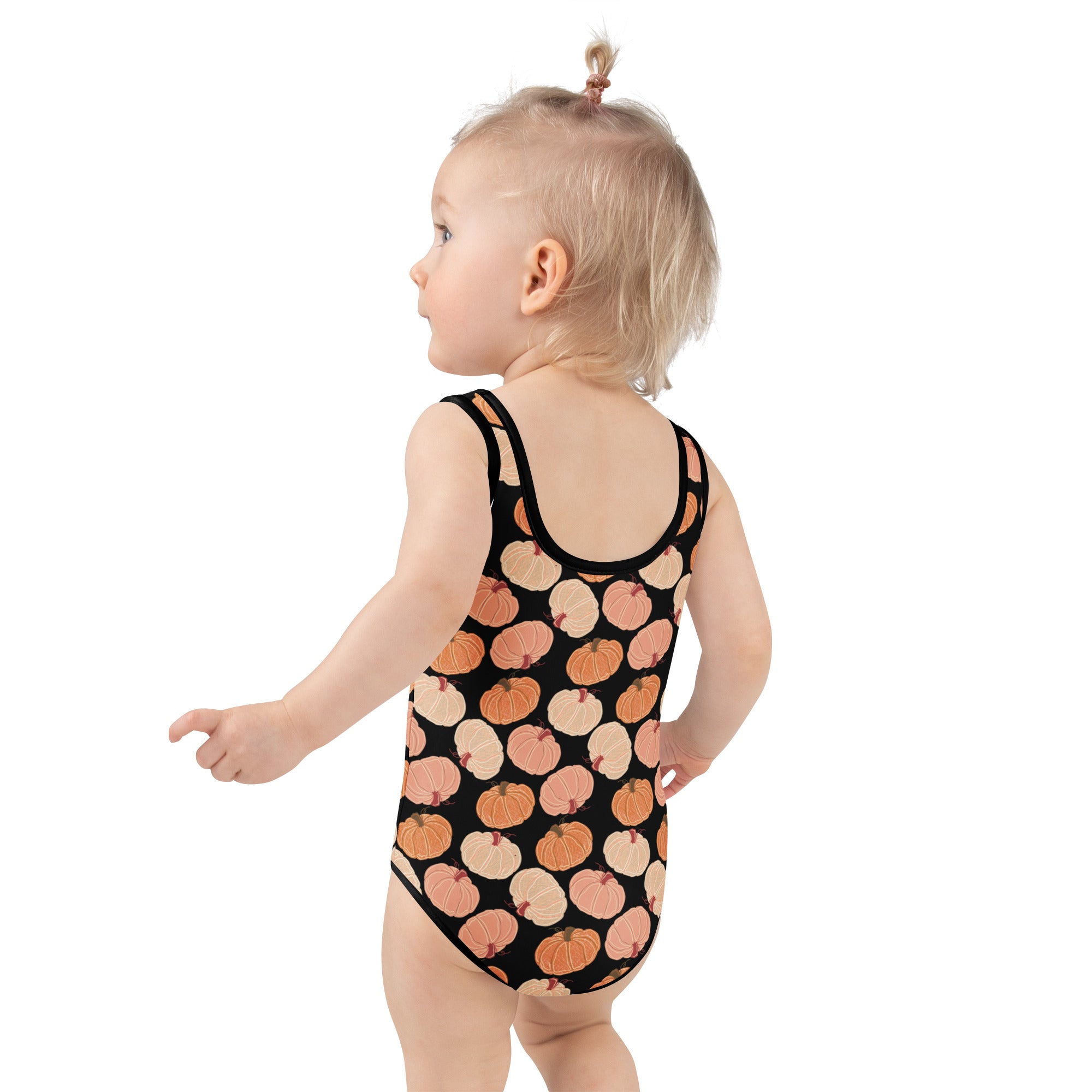 Girls pumpkin patch buttery soft black one-piece swimsuit with orange beige pumpkins and UPF 50 plus protection