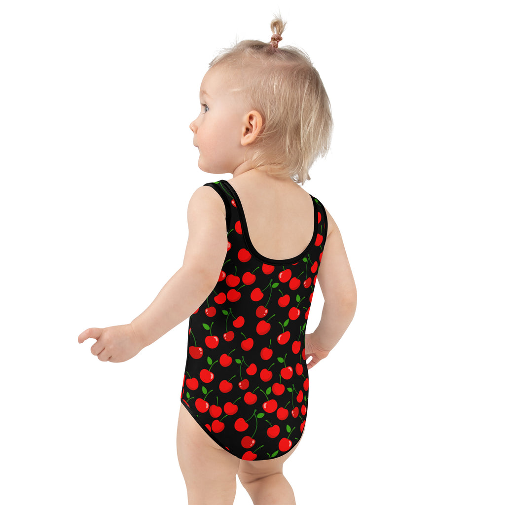 Girls red cherry buttery soft black one-piece swimsuit with vibrant red cherries green stems and upf 50+ protection