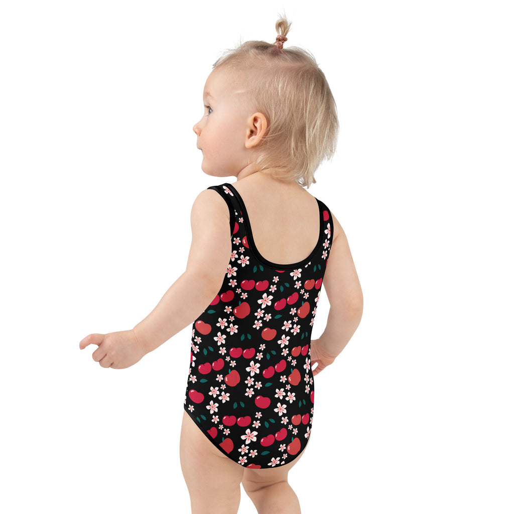 Black one-piece girls swimsuit with red cherry pink floral pattern buttery soft fabric and upf 50 plus protection
