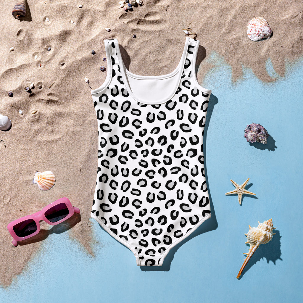 Girls white one-piece swimsuit with black leopard print pattern buttery soft fabric and UPF 50 plus protection