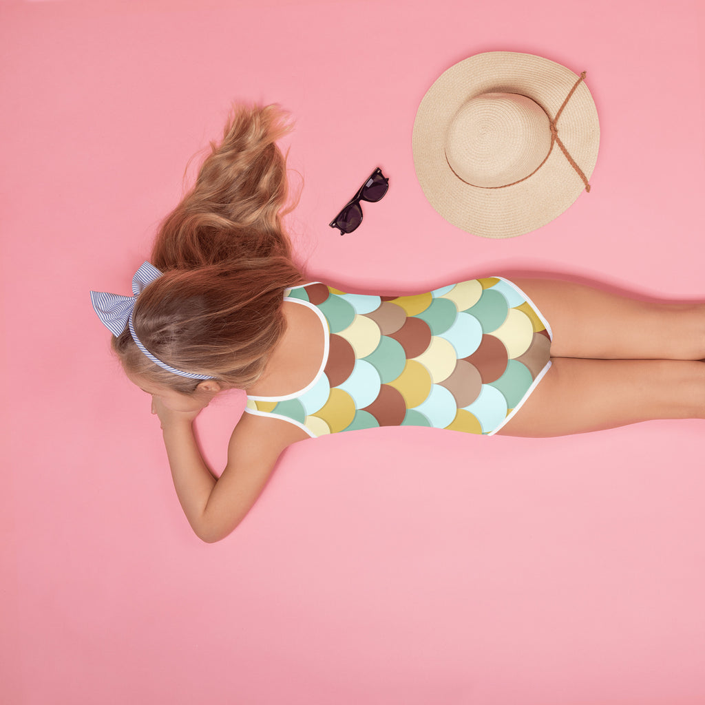 Girls retro mermaid scales one-piece swimsuit in soft mint beige and brown with white trim and UPF 50 plus protection