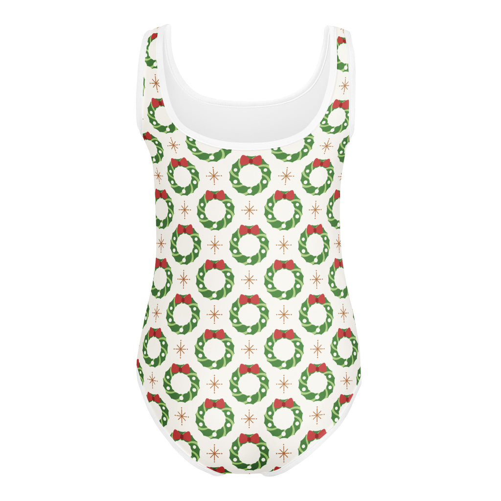 White tank top leotard with festive green wreaths red bows and gold starbursts buttery soft quick drying for dance