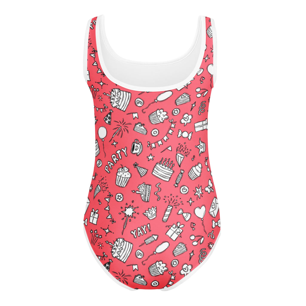 A vibrant coral pink birthday party leotard with playful black and white doodles on buttery soft quick drying fabric