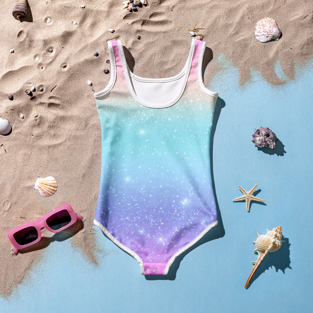 Girls faux sparkle effect rainbow buttery soft swimsuit with upf 50 plus featuring pastel starry galaxy print and pink purple blue hues